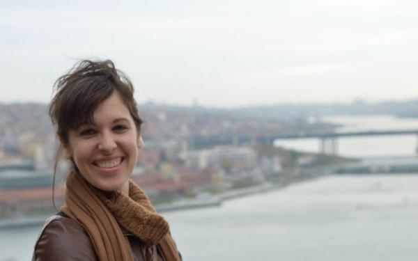 Danielle Schoon - Smiling woman with body of water in background
